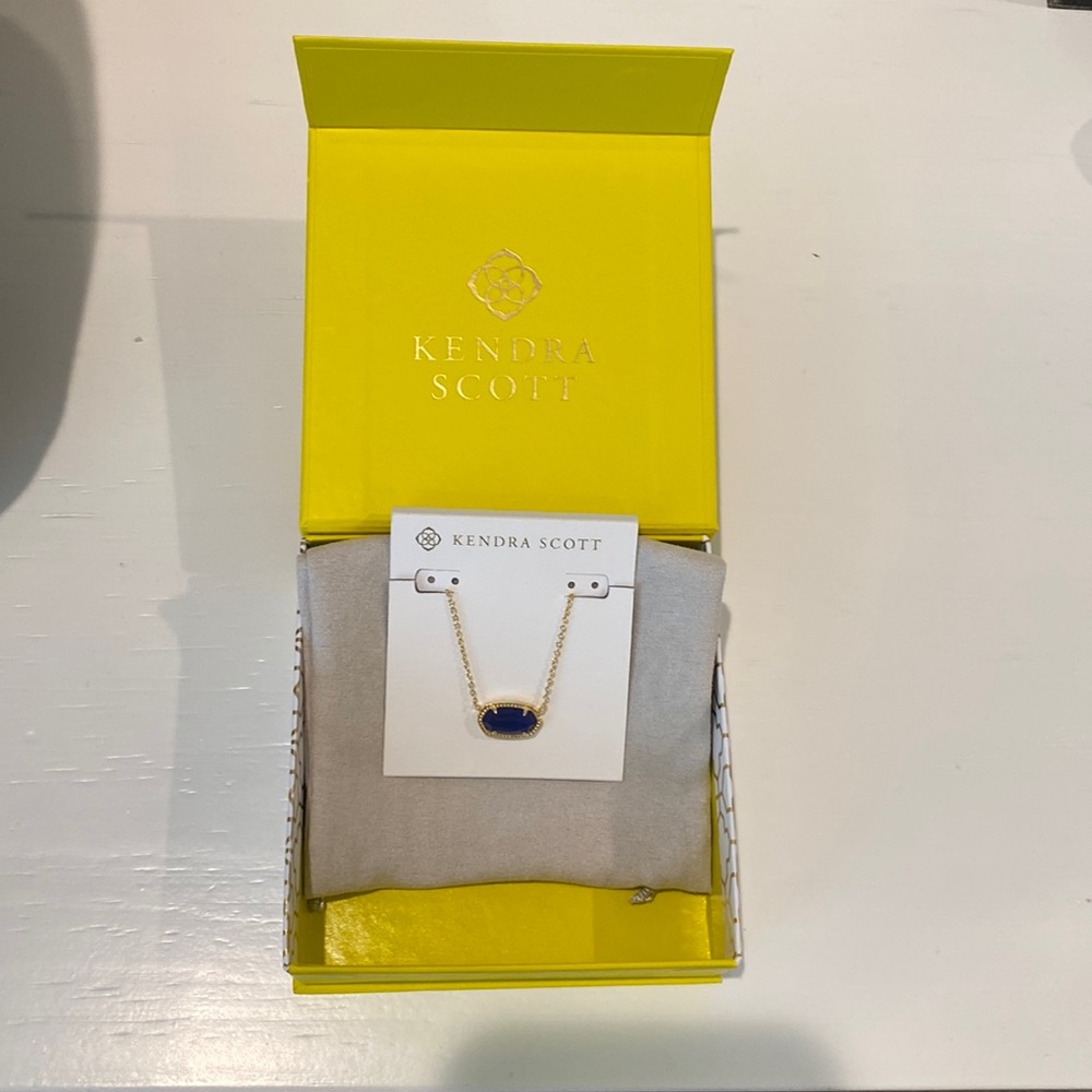 Never worn kendra scott necklace gold and blue